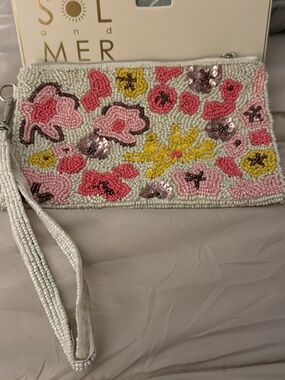 Viral bag. Beaded Floral Wristlet Clutch in White with Pink & Yellow Accents
